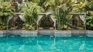 2 outdoor pools, open 8:00 AM to 9:00 PM, free cabanas, pool umbrellas