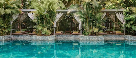 2 outdoor pools, open 8:00 AM to 9:00 PM, free cabanas, pool umbrellas