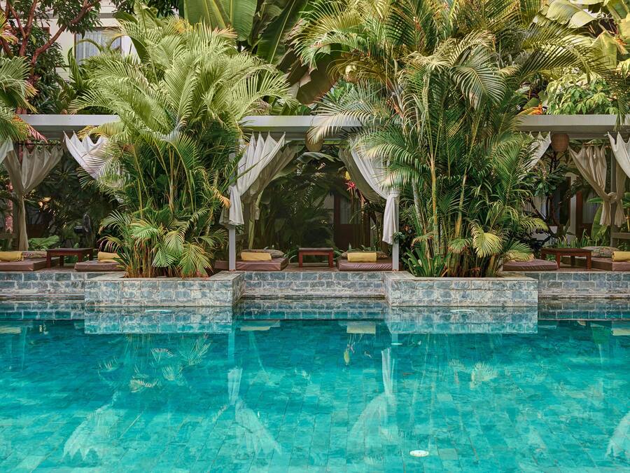 2 outdoor pools, open 8:00 AM to 9:00 PM, free cabanas, pool umbrellas