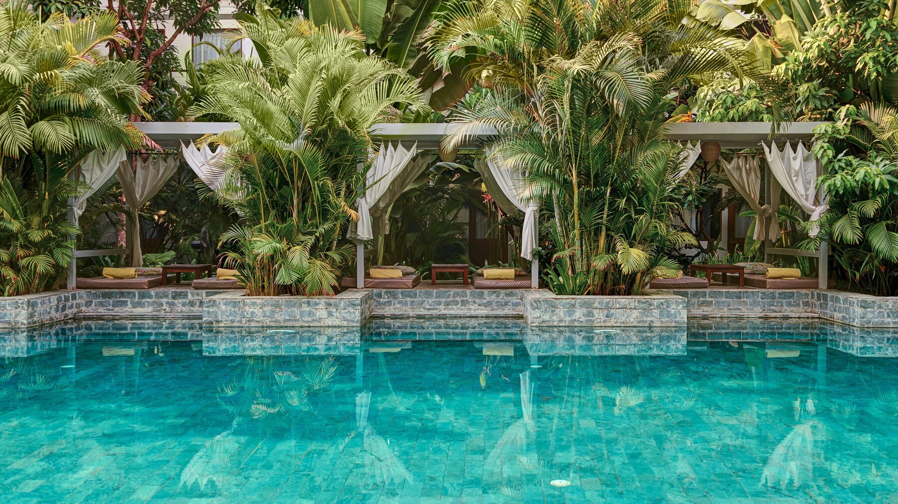 2 outdoor pools, open 8:00 AM to 9:00 PM, free pool cabanas
