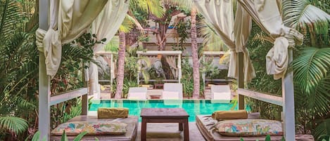 2 outdoor pools, open 8:00 AM to 9:00 PM, free cabanas, pool umbrellas