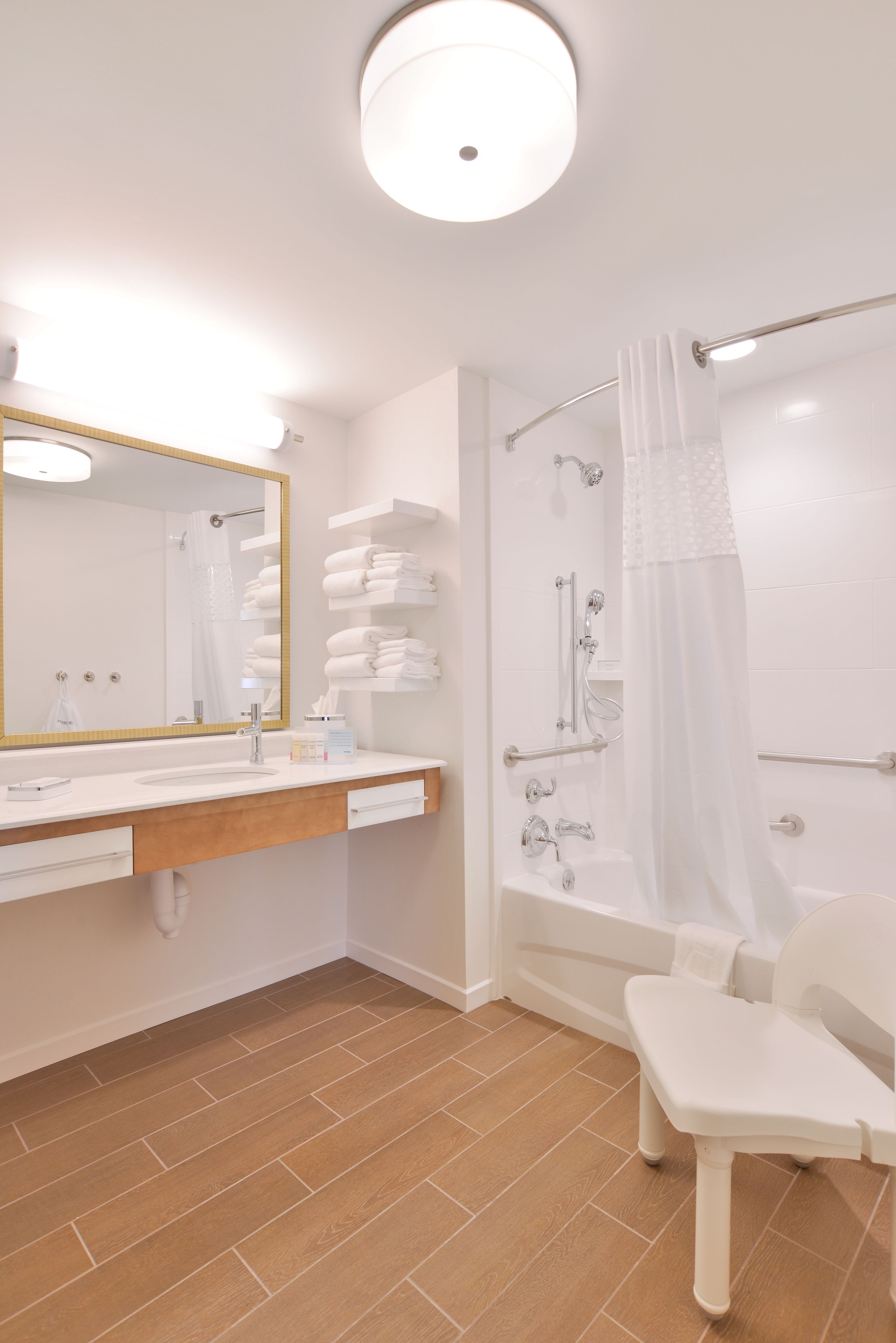 combined shower/bathtub, free toiletries, hair dryer, towels