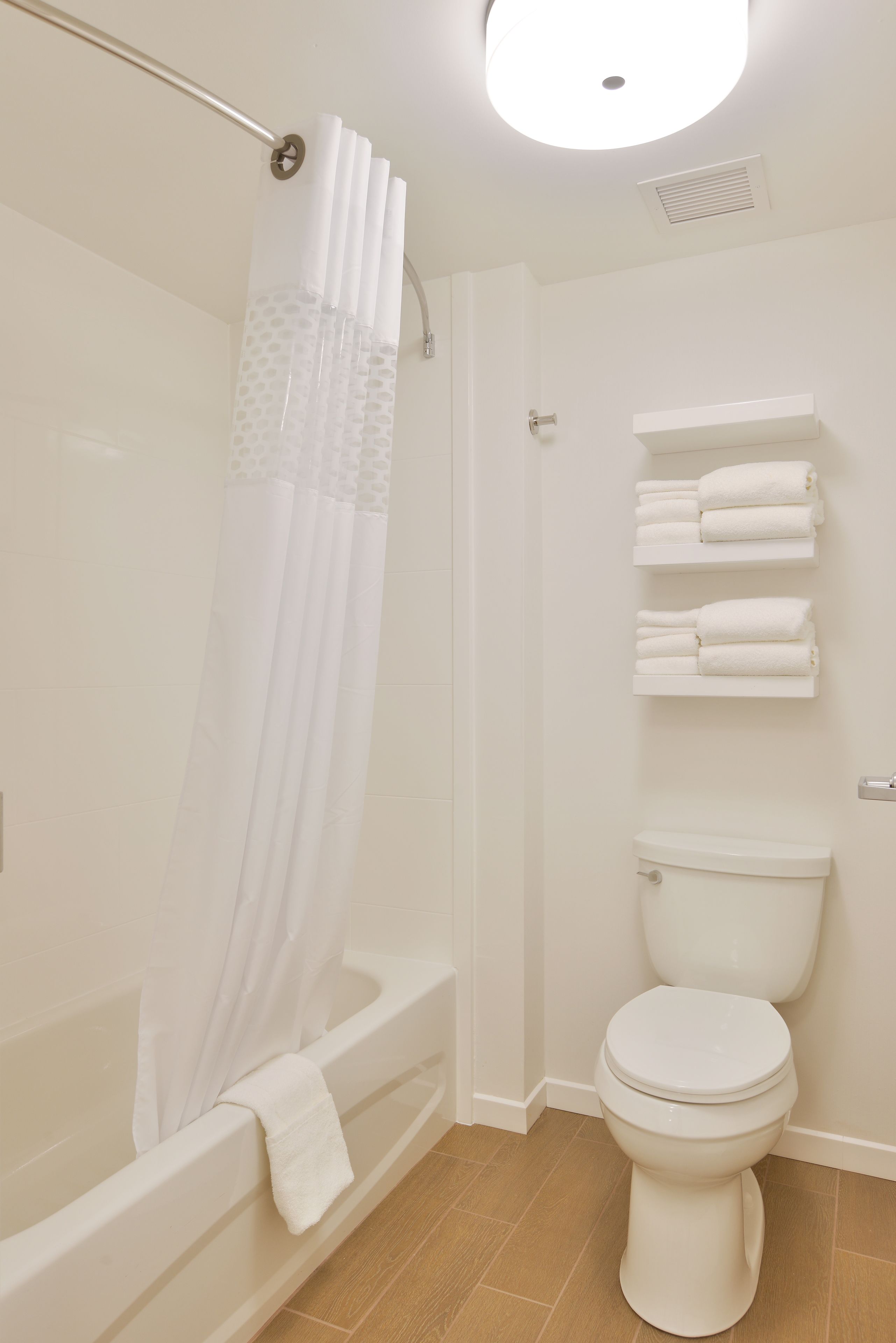 combined shower/bathtub, free toiletries, hair dryer, towels