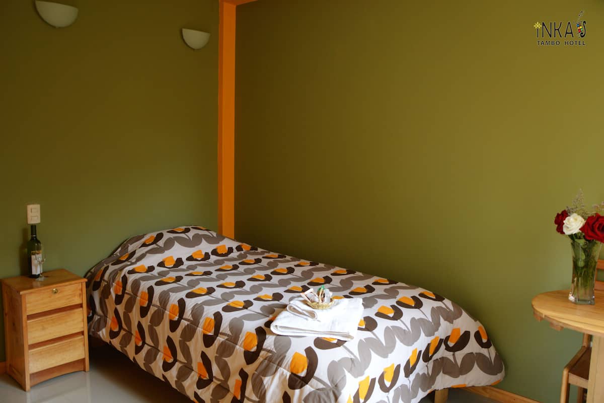 Habitación individual | Cunas (de pago), camas supletorias, wifi gratis