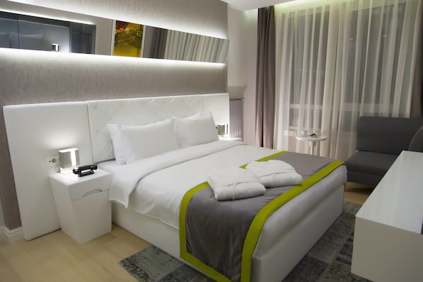 Ropa de cama de alta calidad y minibar