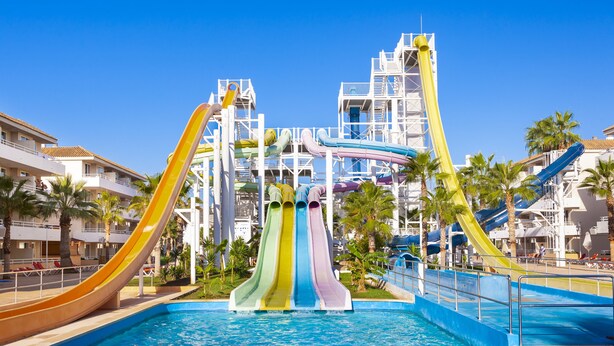 A water park with multiple slides and a pool. - BH Mallorca Apartments - Adults Only (Calvia)