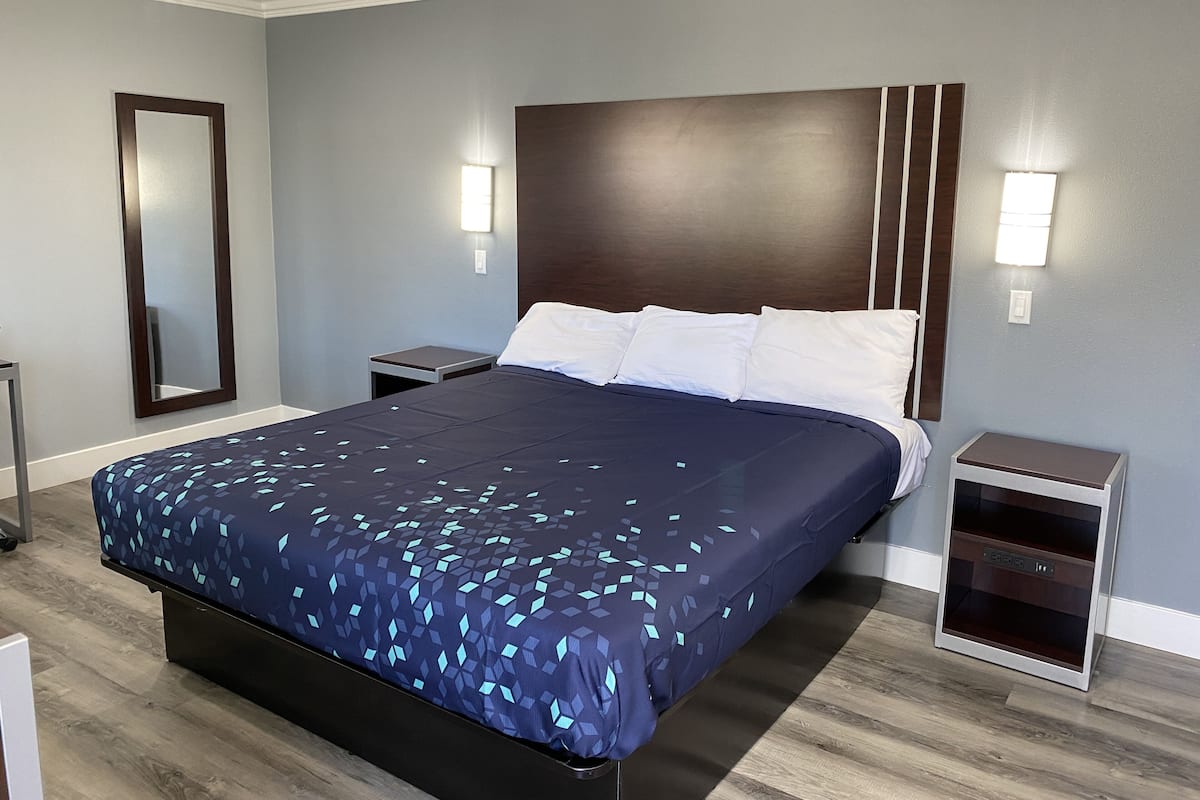 Deluxe Room, 1 King Bed (No Hot Tub) | Individually furnished, desk, laptop workspace, blackout drapes