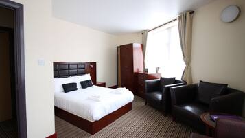 Premium bedding, desk, laptop workspace, iron/ironing board