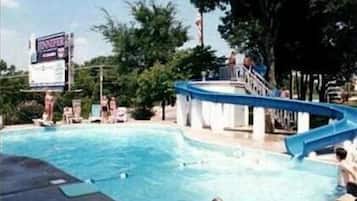 Seasonal outdoor pool, open 8:00 AM to 10:00 PM, pool loungers