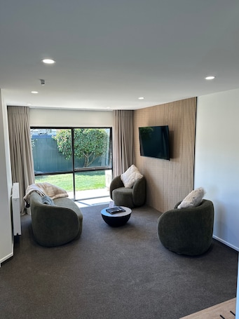 Luxury Apartment, 1 Bedroom | Living area | 55-inch flat-screen TV with satellite channels, TV