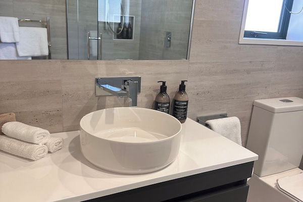 Eco-friendly toiletries, hair dryer, towels