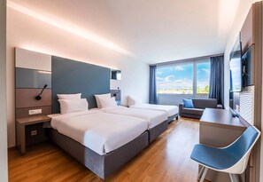 Triple Room, Non Smoking | Premium bedding, in-room safe, desk, laptop workspace