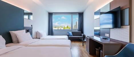 Triple Room, Non Smoking | Premium bedding, in-room safe, desk, laptop workspace