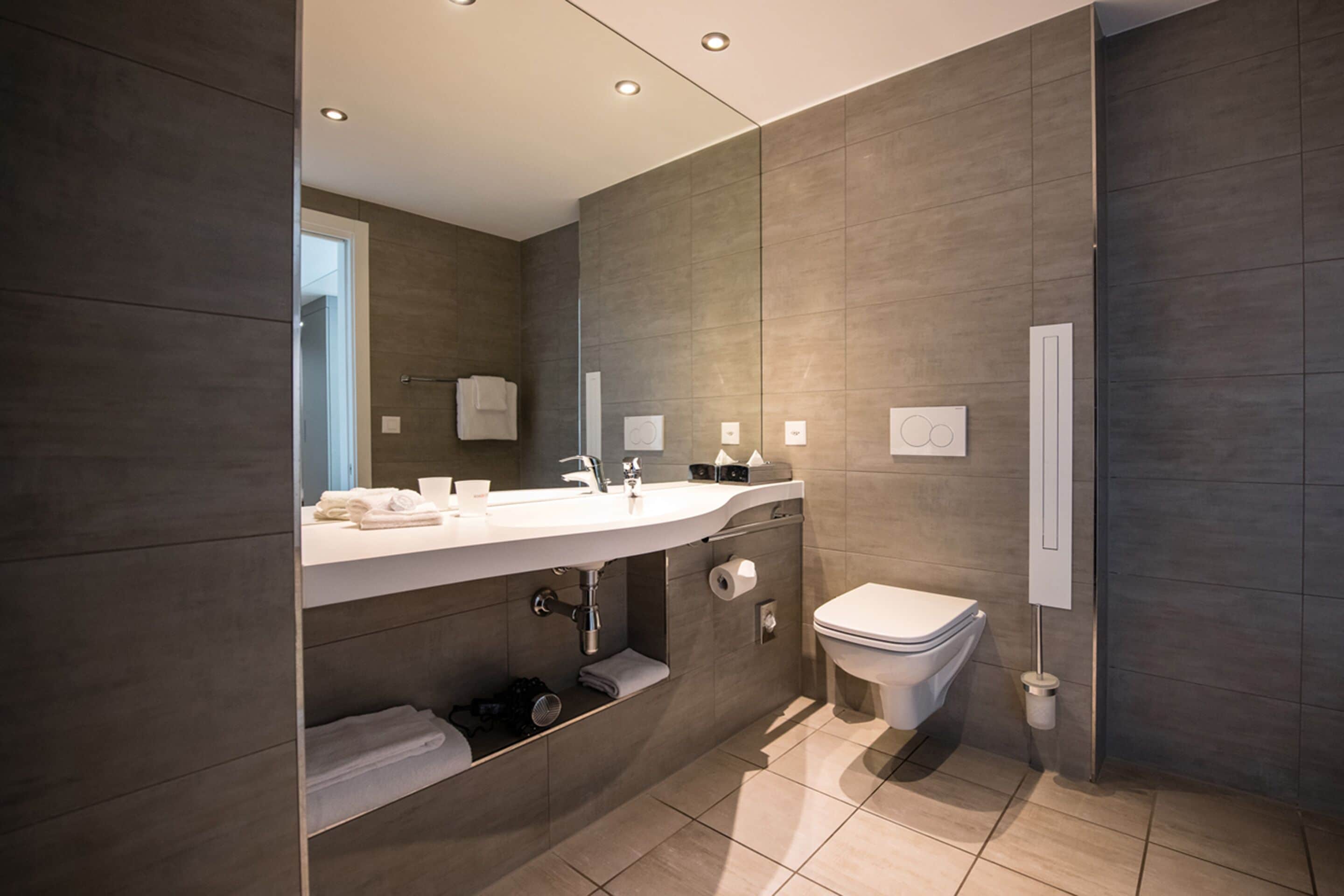 junior suite | bathroom | shower, rainfall showerhead, free toiletries, hair dryer