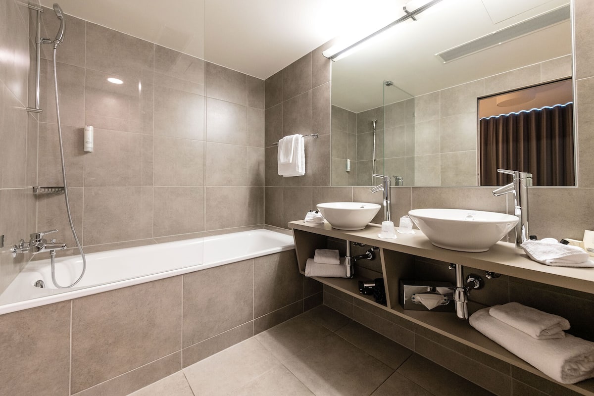 junior double or twin room | bathroom | free toiletries, hair dryer, towels