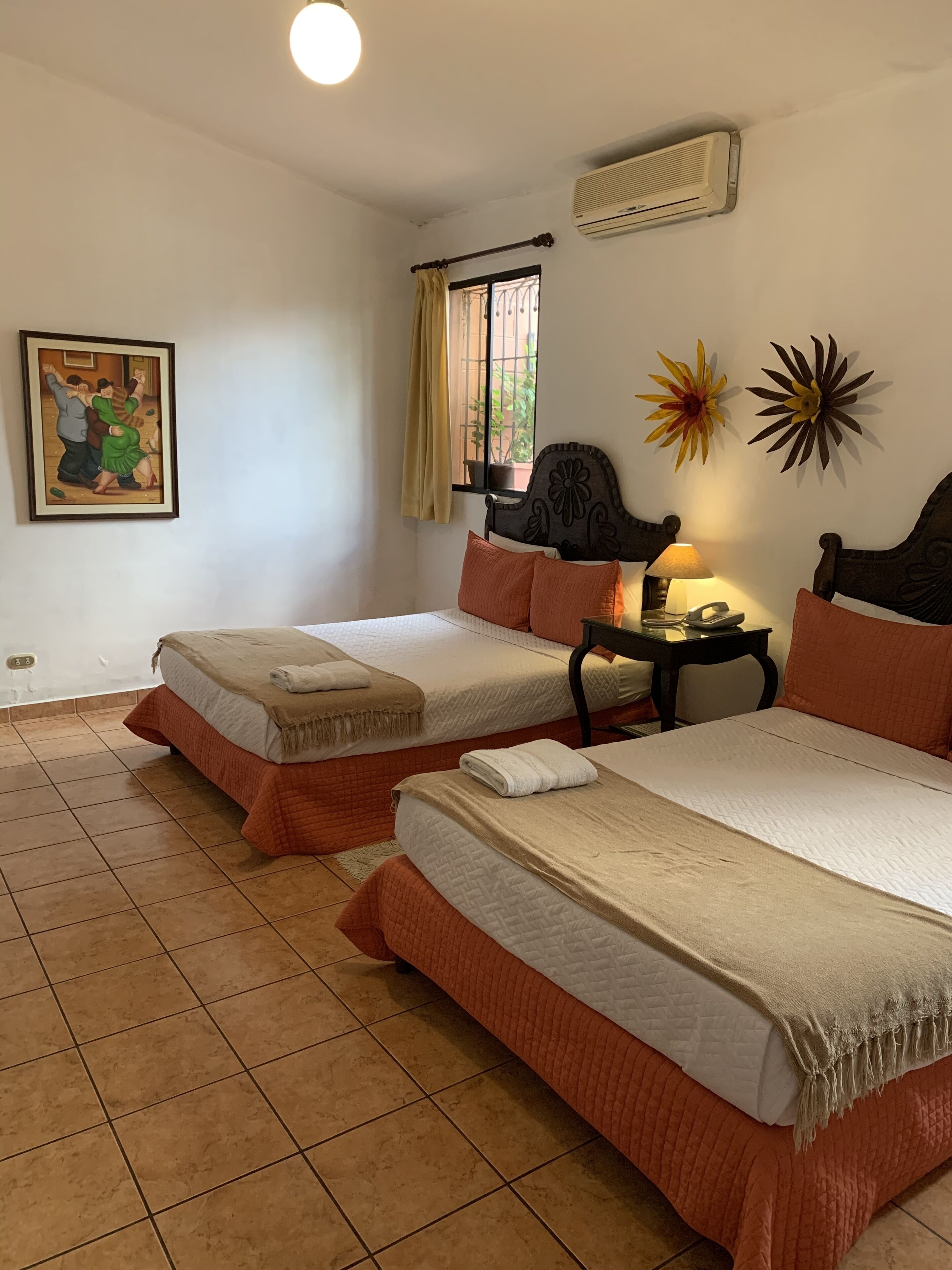 double room (two double beds) | premium bedding, individually decorated, desk, laptop workspace