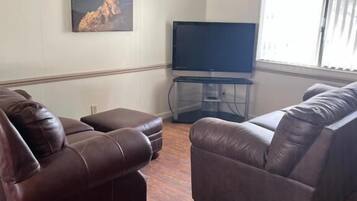 3 Bedroom House | Living area | Flat-screen TV