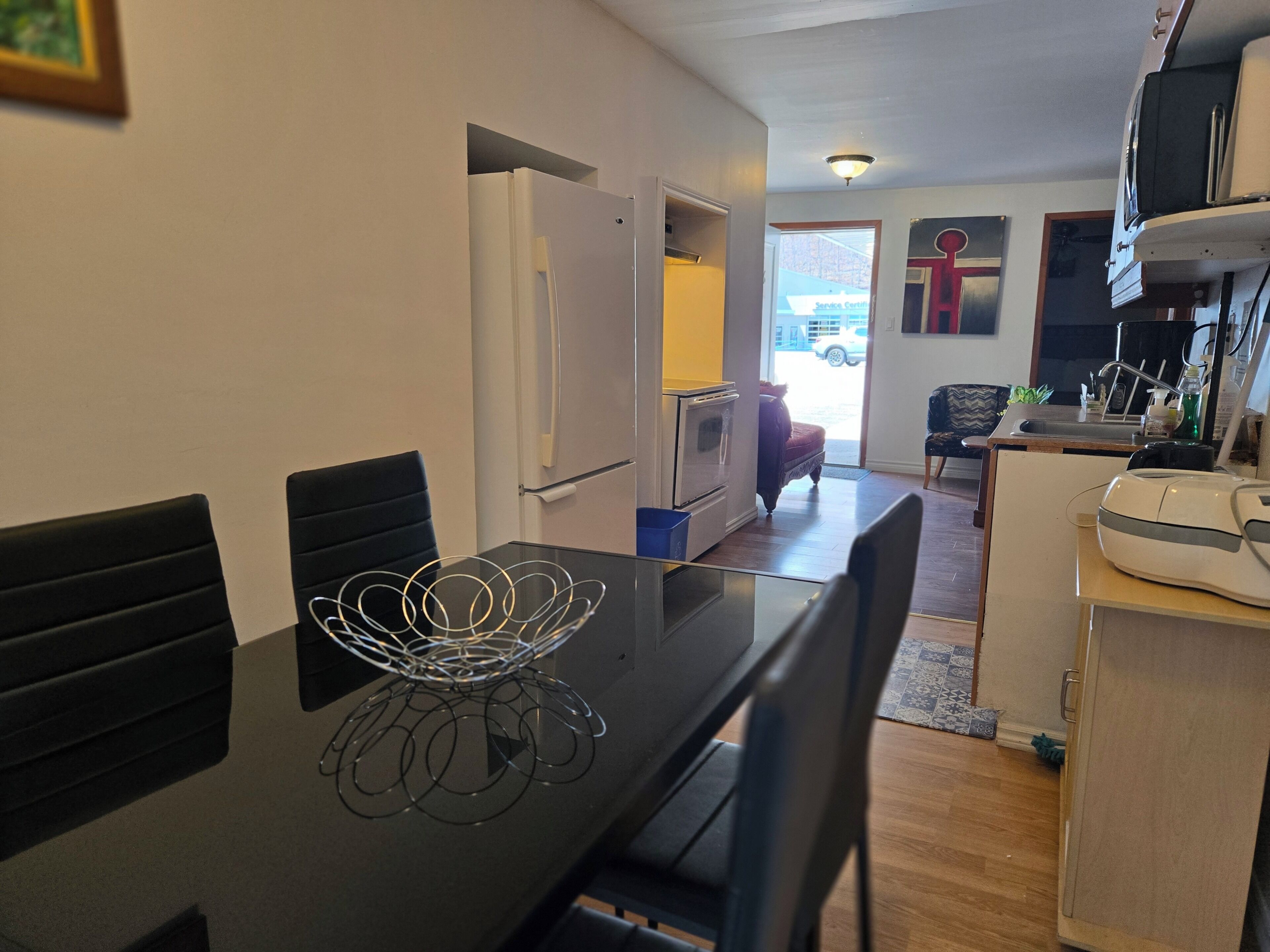 Family Condo, 2 Bedrooms | Private kitchen | Mini-fridge, microwave, coffee/tea maker, dining tables