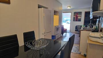 Family Condo, 2 Bedrooms | Private kitchen | Mini-fridge, microwave, coffee/tea maker, dining tables