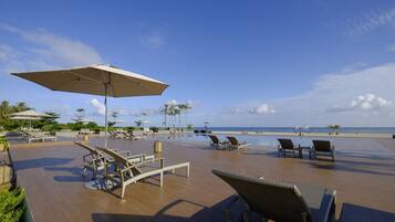 Outdoor pool, open 6:00 AM to 10:00 PM, pool umbrellas, pool loungers