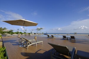 Outdoor pool, open 6:00 AM to 10:00 PM, pool umbrellas, sun loungers
