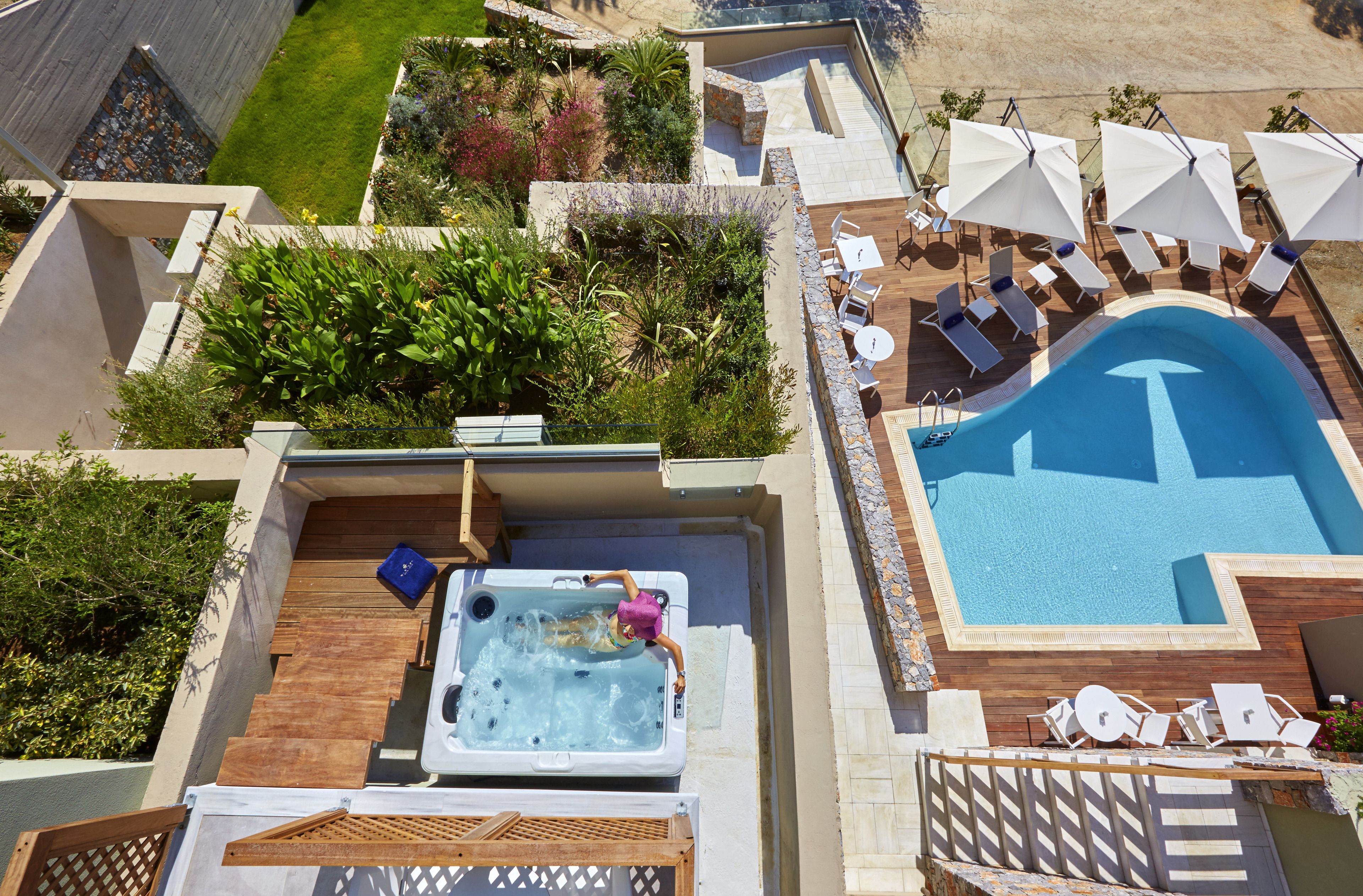 2 outdoor pools, open 11:00 am to 7:00 pm, pool umbrellas, pool loungers