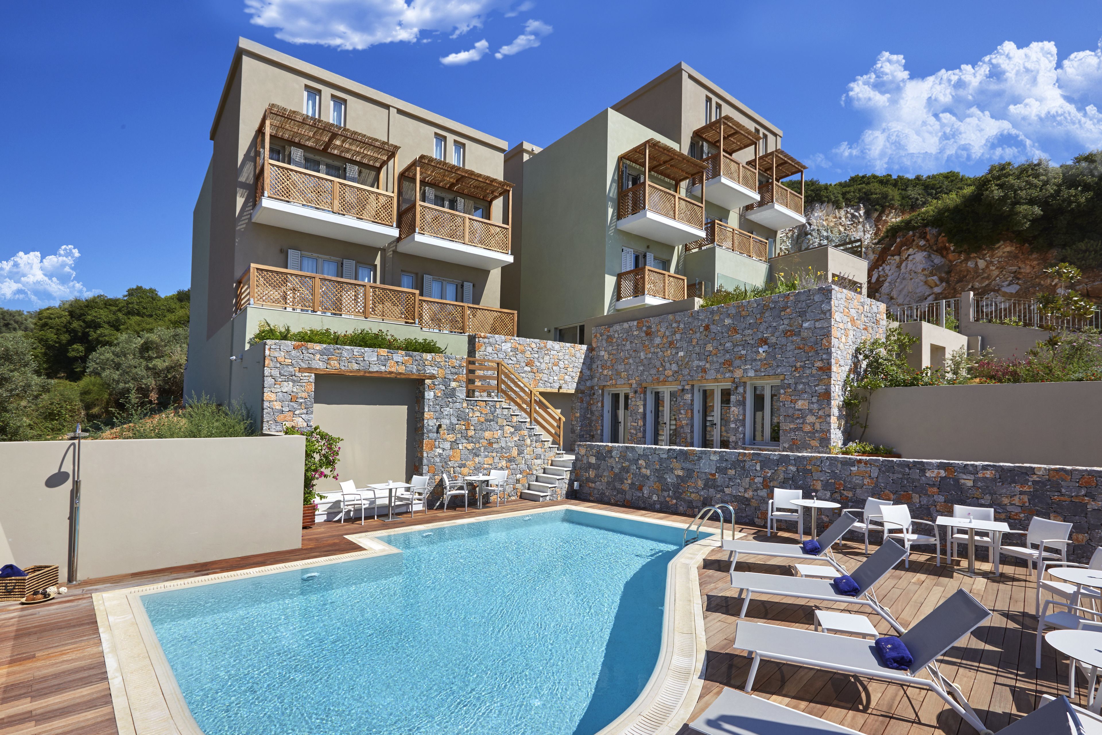 2 outdoor pools, open 11:00 am to 7:00 pm, pool umbrellas, pool loungers