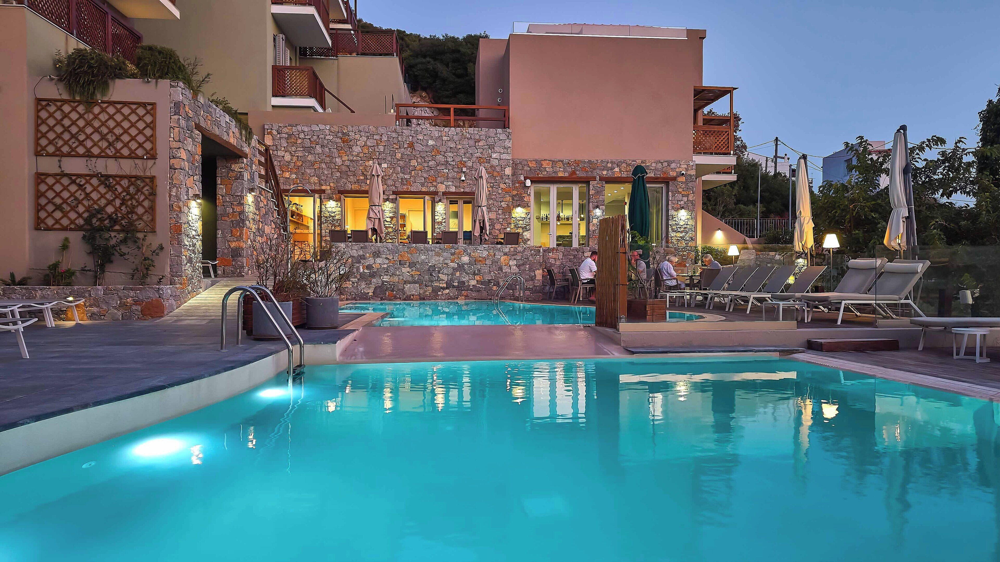 2 outdoor pools, open 11:00 AM to 7:00 PM, pool umbrellas, pool loungers