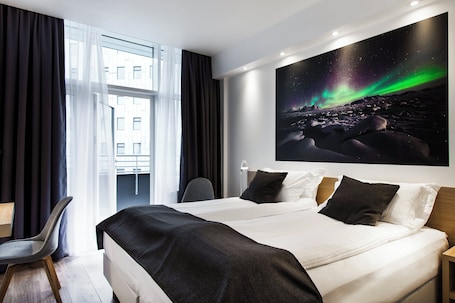 Economy Twin Room, Ground Floor | Desk, blackout drapes, soundproofing, free WiFi