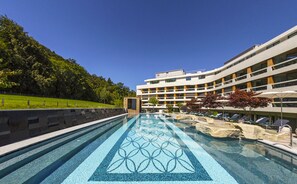 Indoor pool, outdoor pool, pool umbrellas, sun loungers