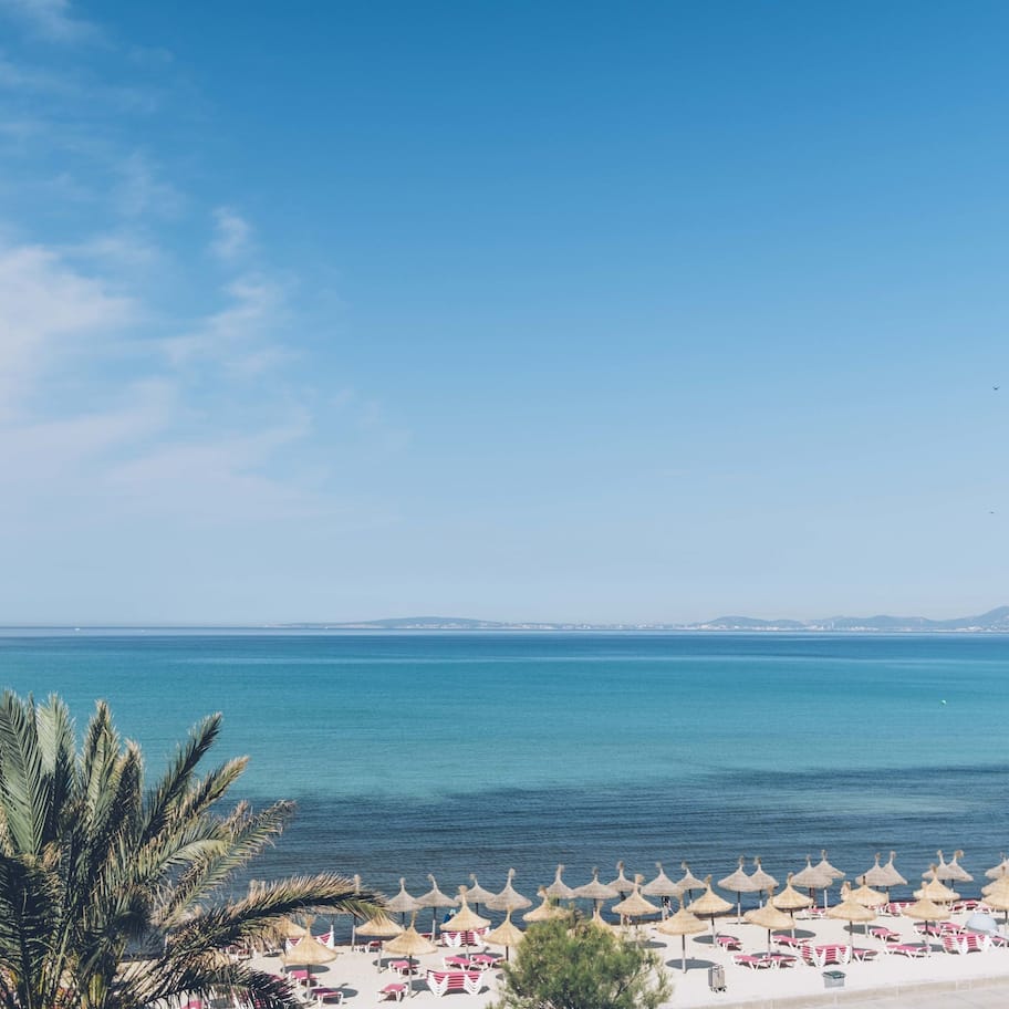 On the beach, white sand, beach towels