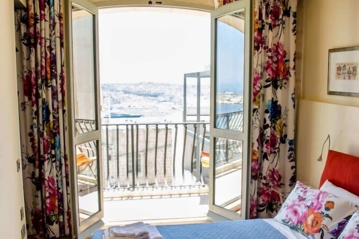 Appartement Penthouse, 2 chambres | 1 chambre, coffre-fort, rideaux dâobscurcissement