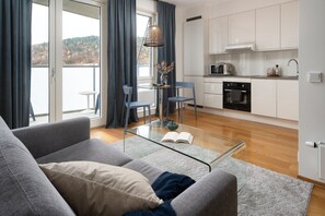 Sørenga - Two Bedroom Apartment | Private kitchen | Full-size fridge, microwave, stovetop, dishwasher