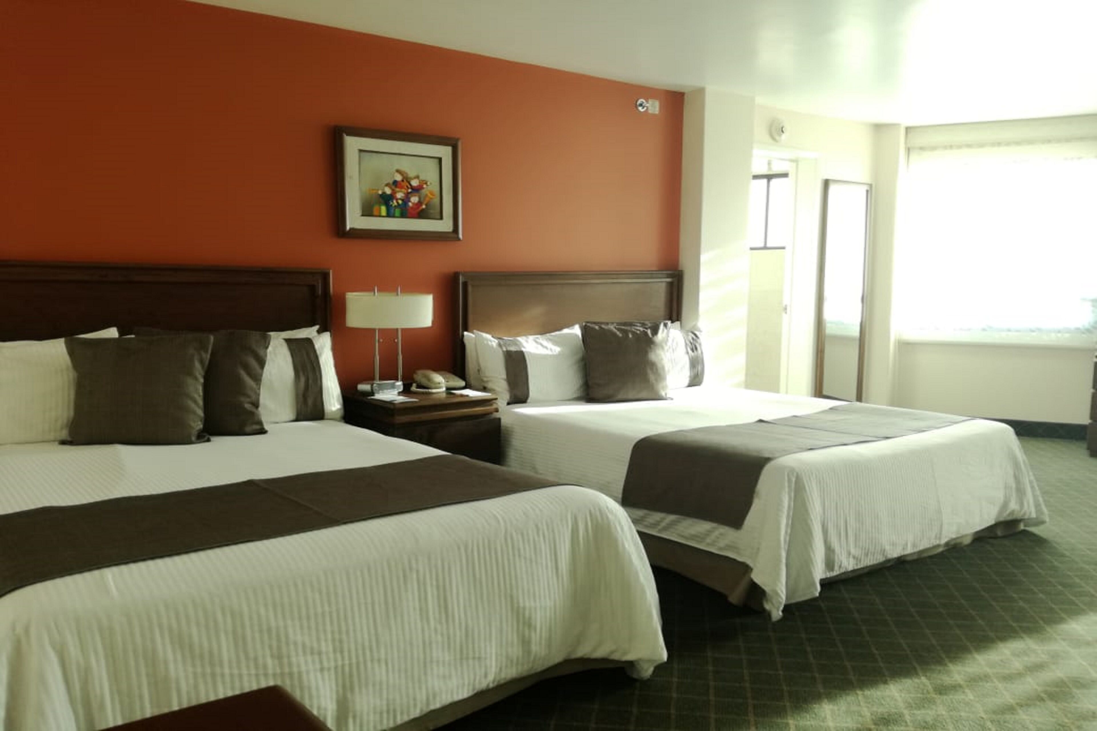 room, 2 double beds ((preferencial)) | in-room safe, desk, iron/ironing board, free wifi