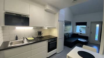 Apartment | Private kitchen | Fridge, microwave, coffee/tea maker, freezer