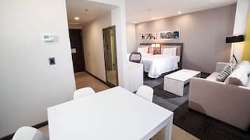 Suite, 2 camas individuales, para no fumadores | Caja de seguridad en la habitación, cortinas blackout y cunas gratuitas