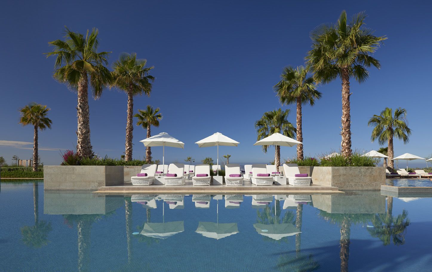 2 outdoor pools, pool umbrellas, pool loungers