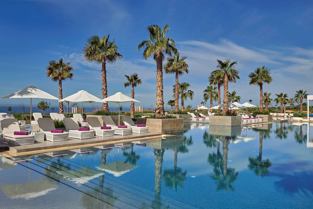 2 outdoor pools, pool umbrellas, pool loungers