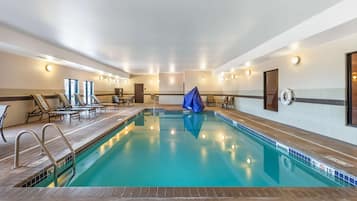 Indoor pool, open 6:00 AM to 11:00 PM, pool loungers