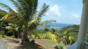Deluxe Studio | View from room - Bay View Lodges (Calibishie)