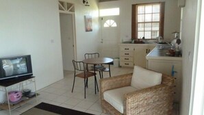 Deluxe Studio | Living area - Bay View Lodges (Calibishie)