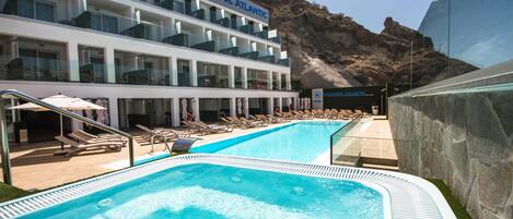 Outdoor pool, sun loungers