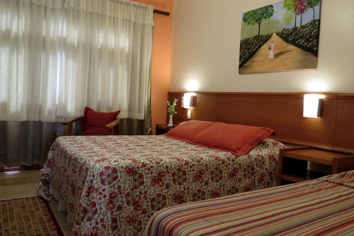 Standard Room | Minibar, individually decorated, blackout drapes, free cribs/infant beds