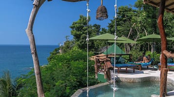 Outdoor pool, pool umbrellas, pool loungers