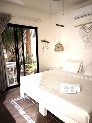 Deluxe Double Room, Ground Floor Terrace | Frette Italian sheets, down duvets, minibar, in-room safe - Hotel Boutique Pachamama (Mahahual)
