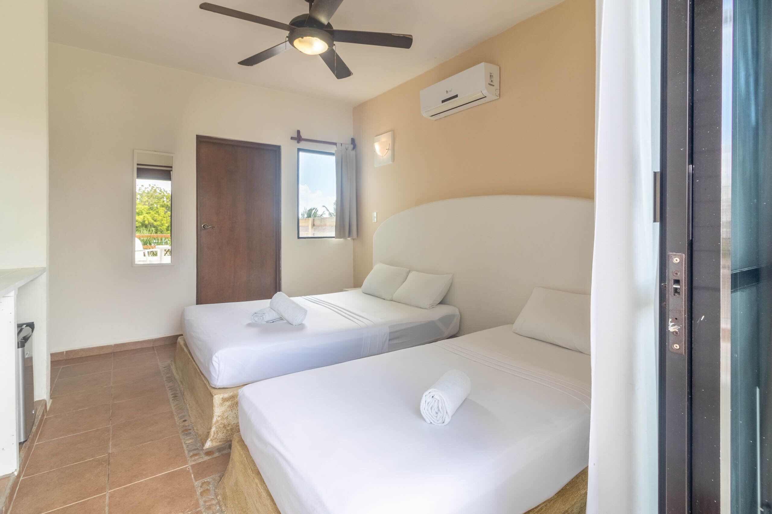 executive triple room, with terrace, first floor | frette italian sheets, down duvets, minibar, in-room safe