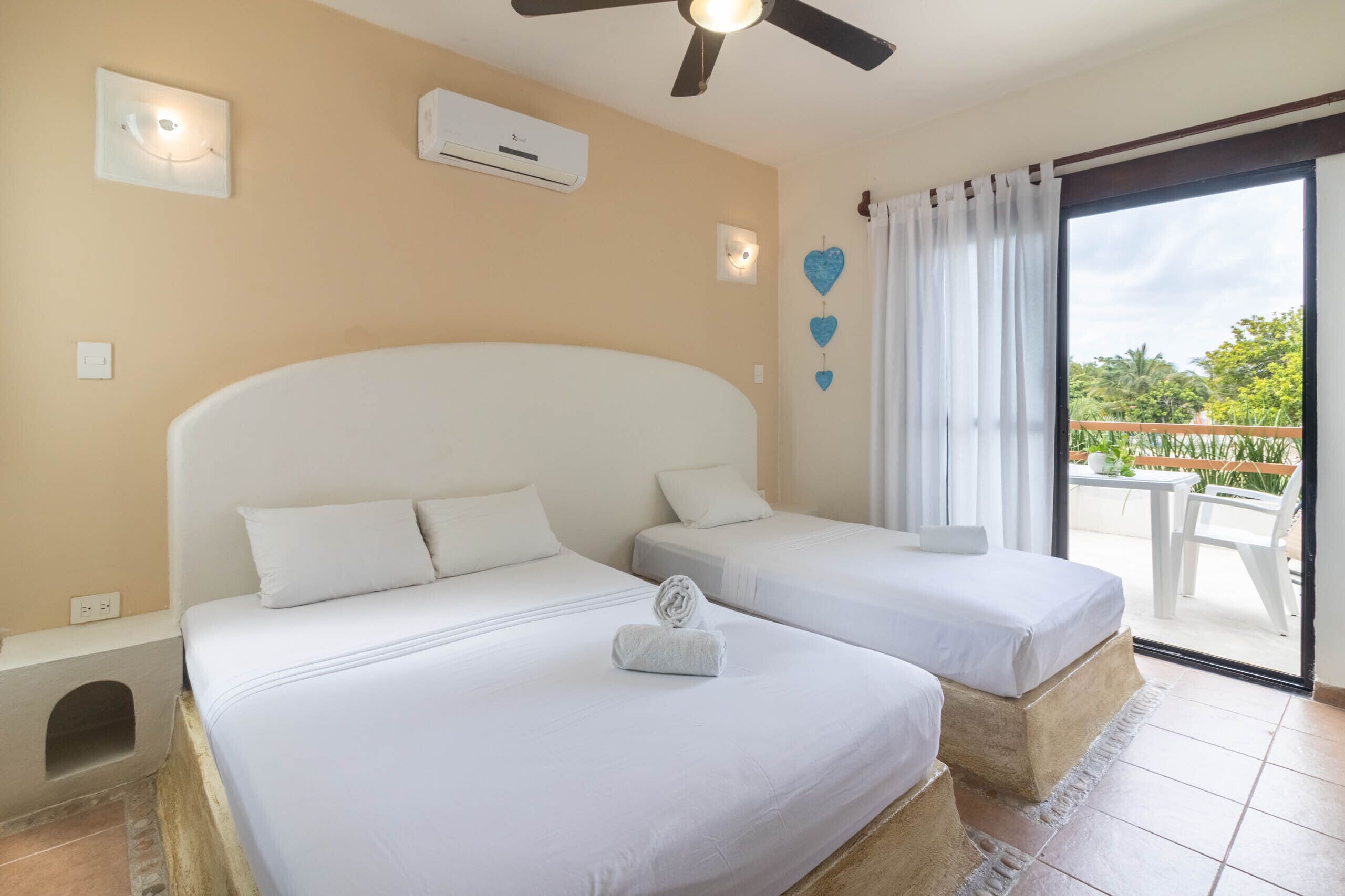 executive triple room, with terrace, first floor | frette italian sheets, down duvets, minibar, in-room safe