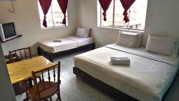 Deluxe Triple Room | Desk, iron/ironing board, rollaway beds, free WiFi
