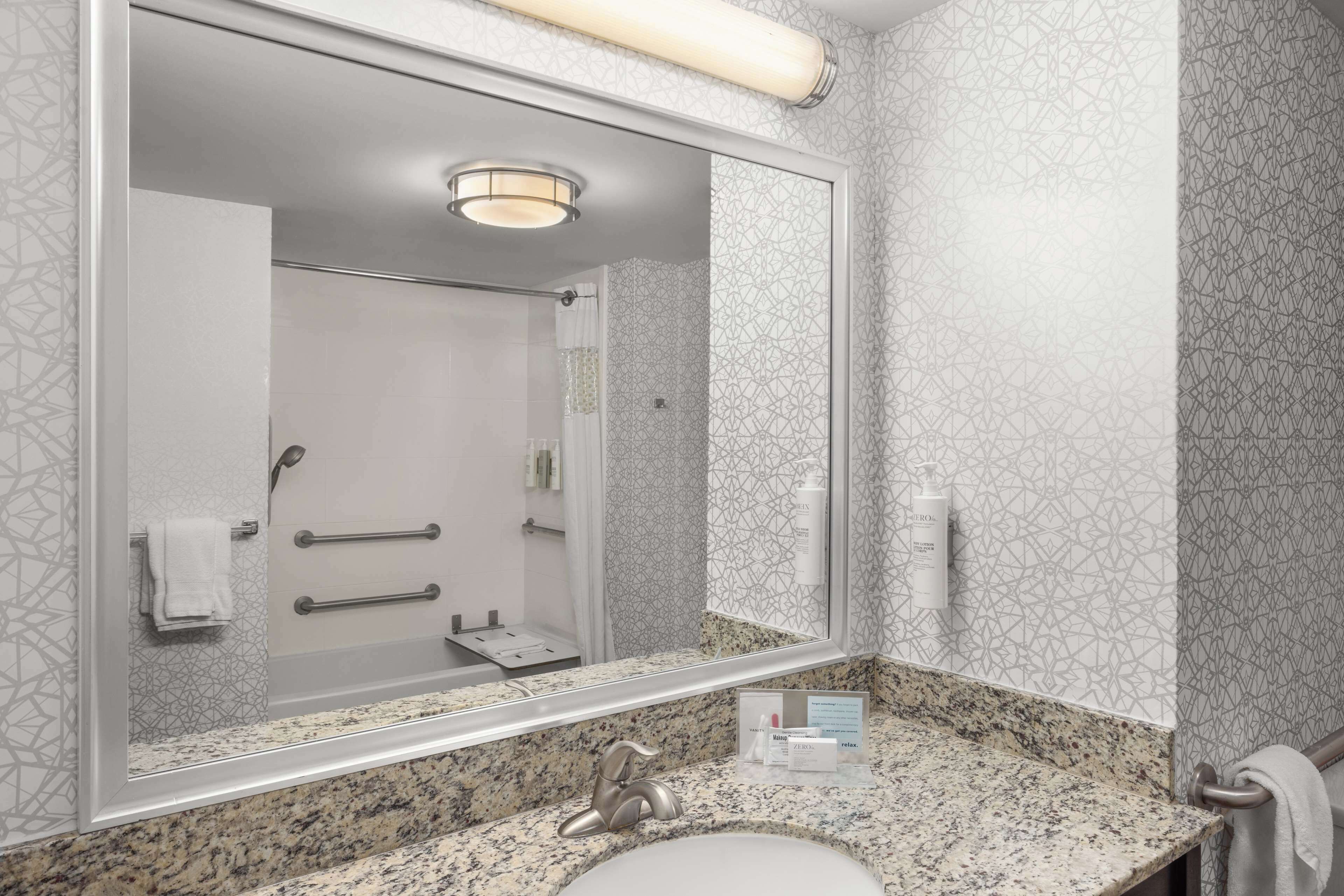 hydromassage showerhead, free toiletries, hair dryer, towels