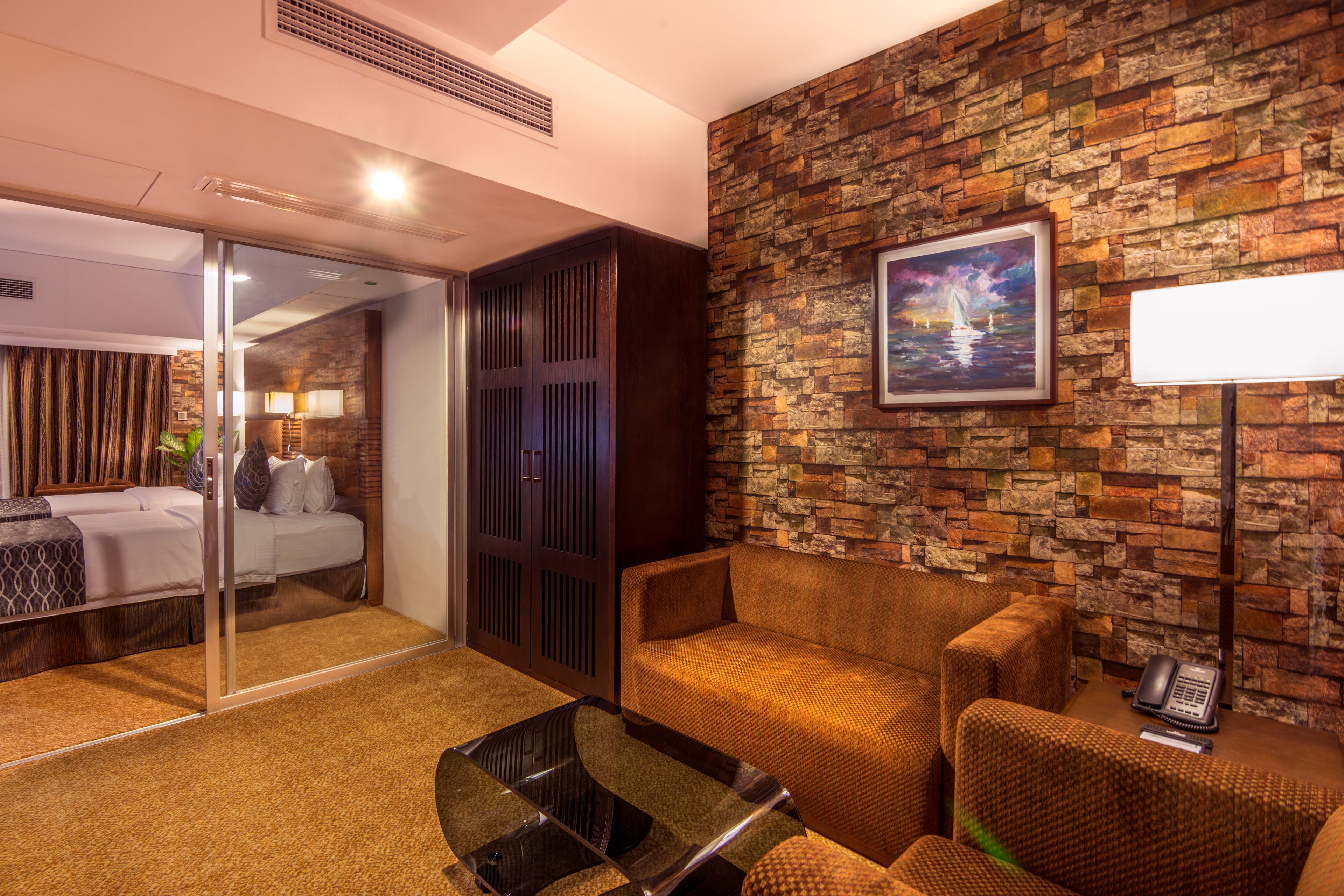 premier twin room | living area | led tv, ipod dock